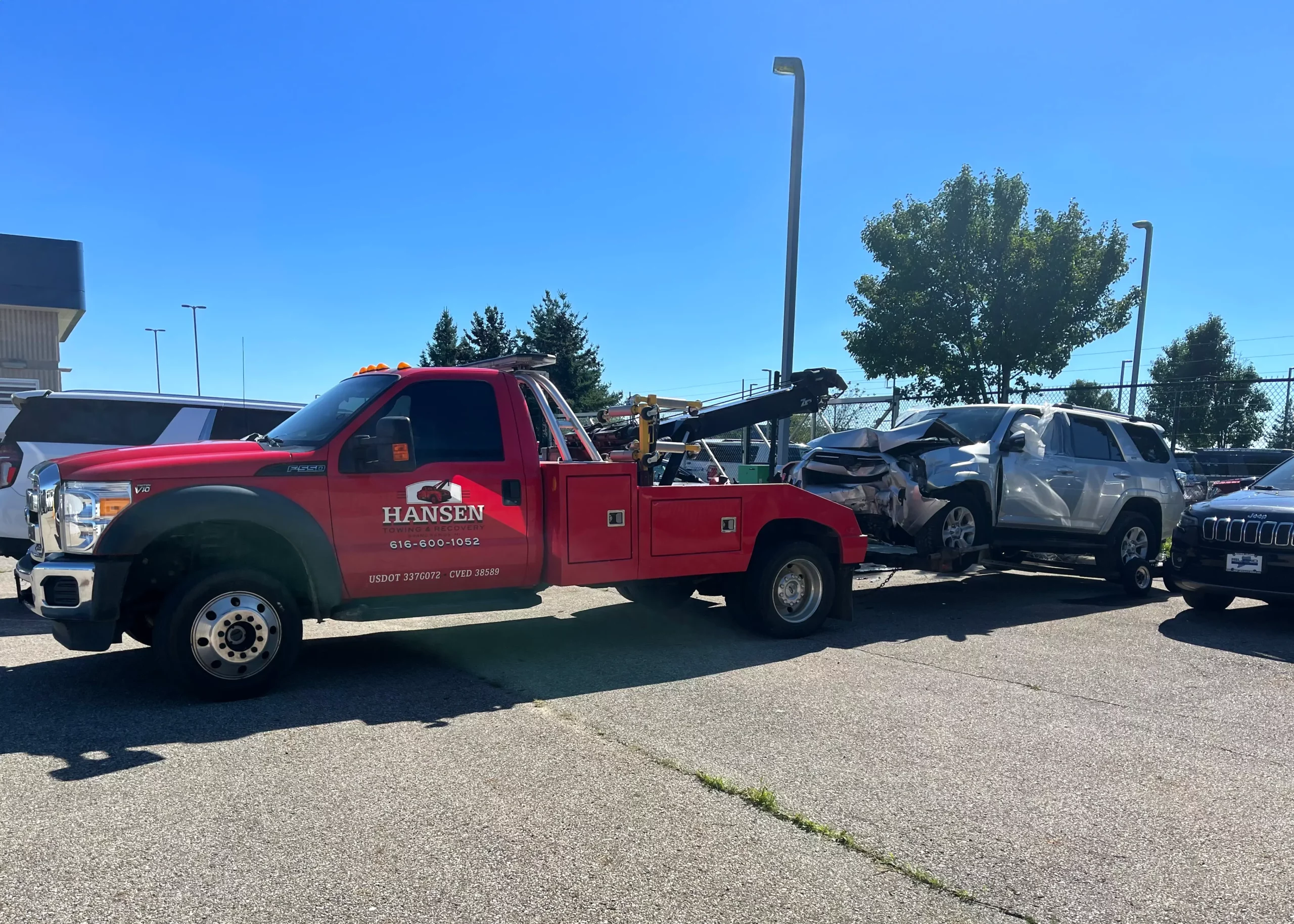 Totaled vehicle being towed in Grand Rapids, MI