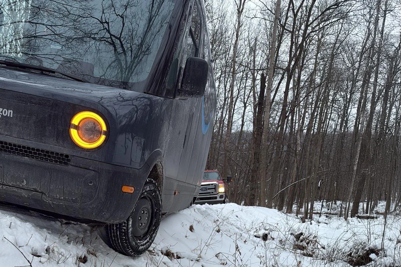 Amazon electric delivery van being winched out by Hansen Towing in East Grand Rapids, MI