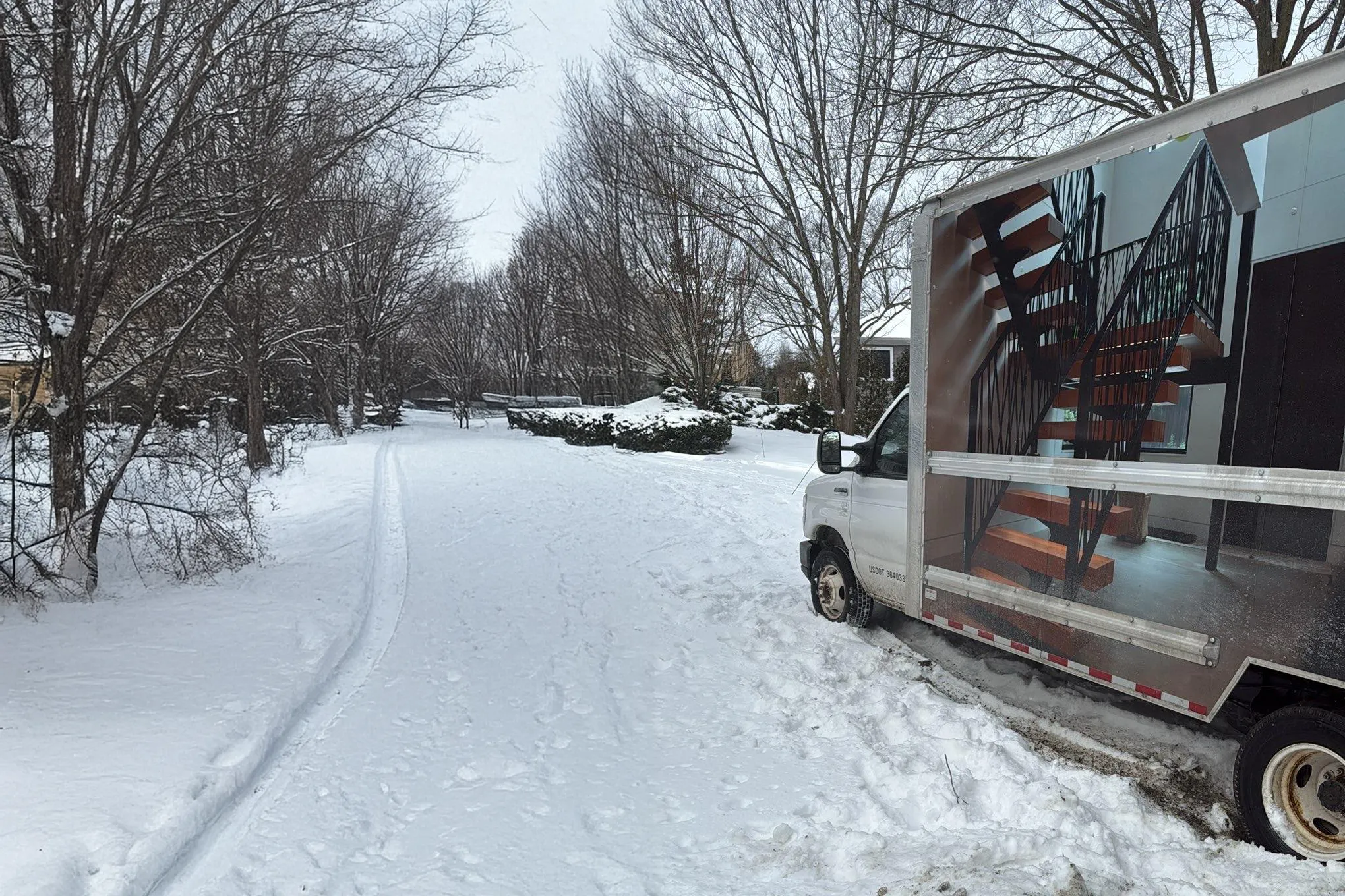 Box truck being recovered by Hansen Towing in Walker, MI