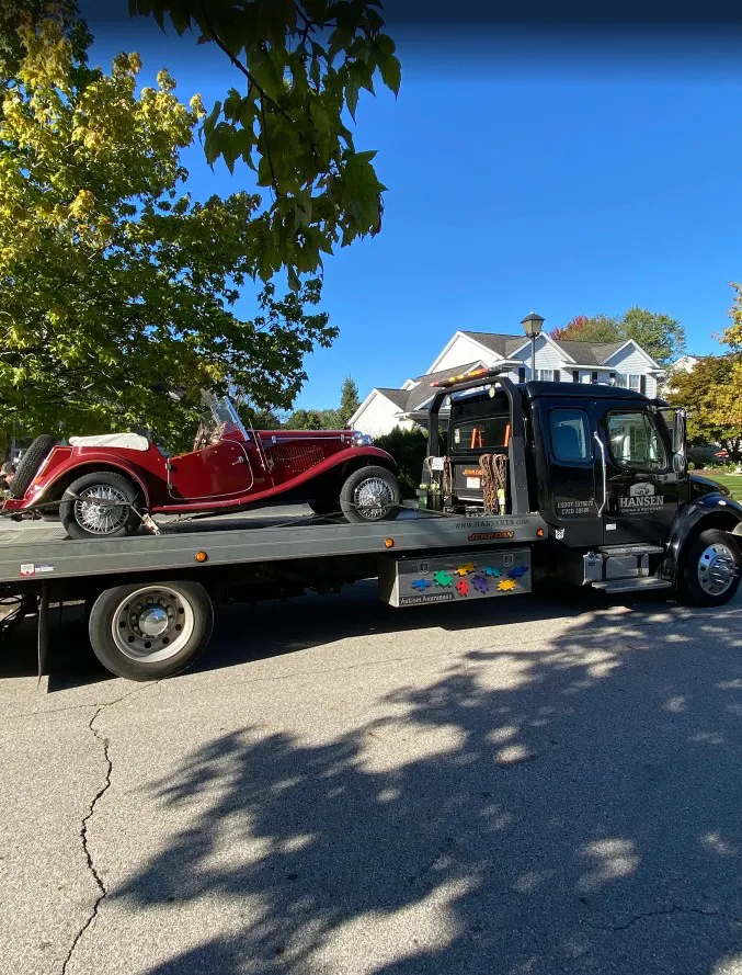 Classic car being transported to a car show by Hansen Towing & Recovery in Grand Rapids, MI